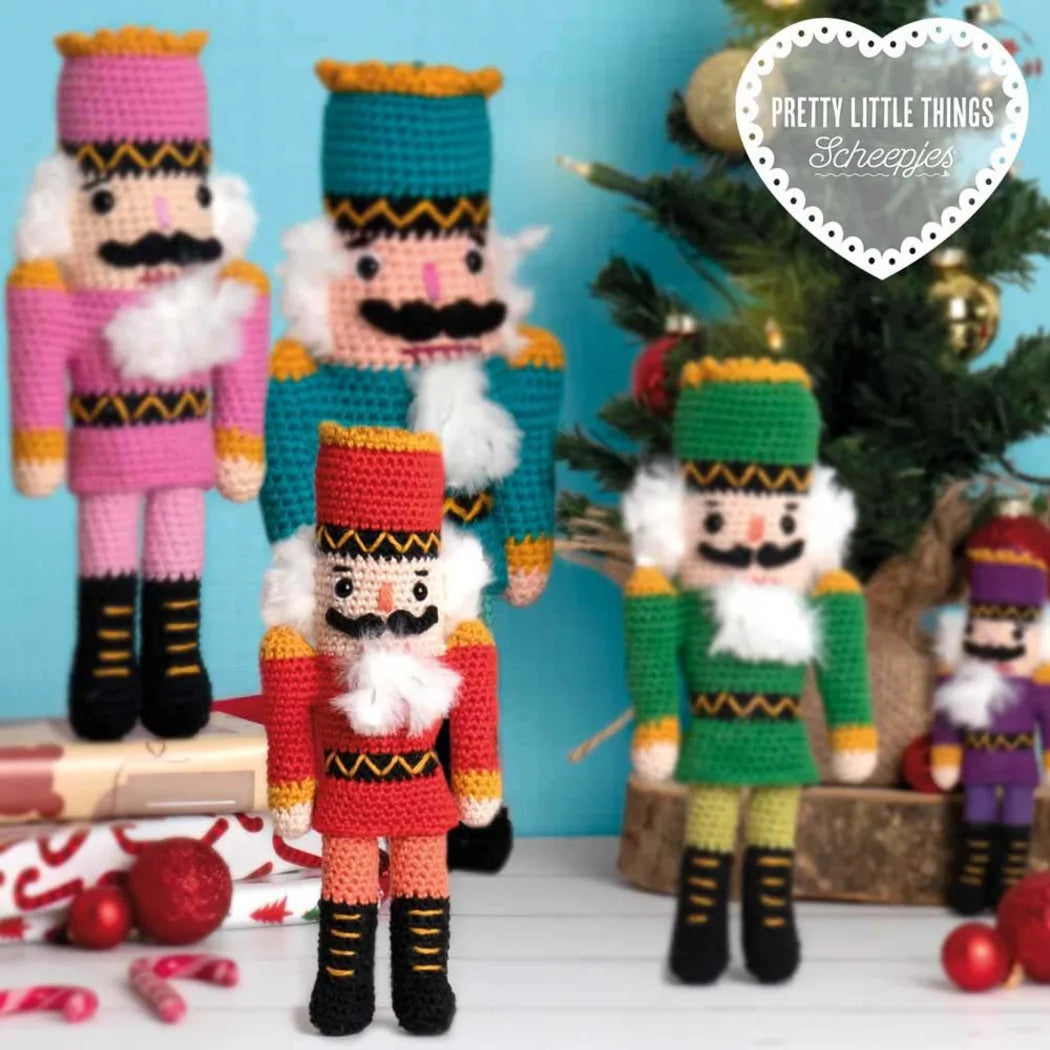 Scheepjes Nutcracker Crochet Kit designed by Kate McCully at Maker Studio Eastbourne.  Limited edition set with yarn and materials to make four 20 cm handmade nutcracker figures, two in red uniforms and two in green.