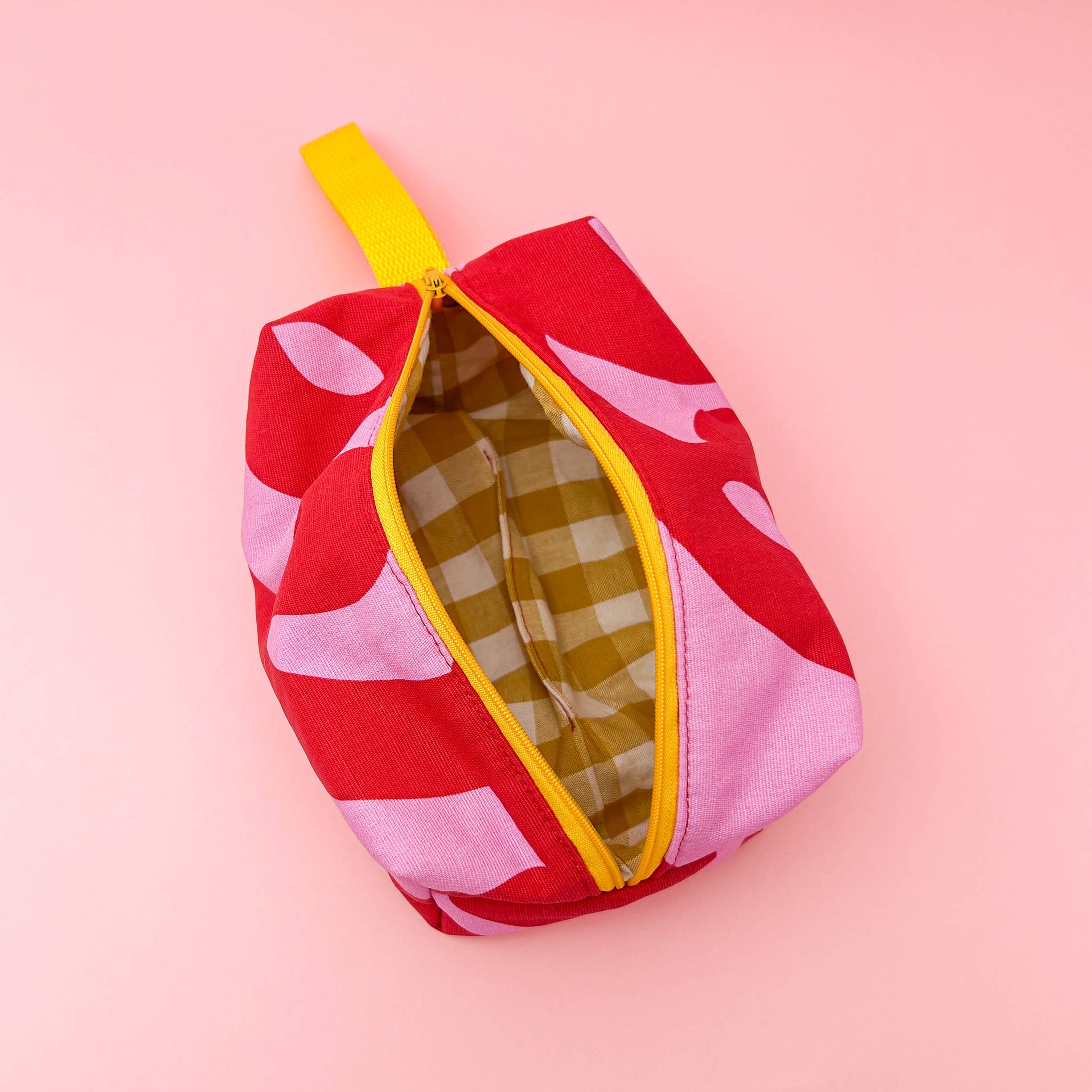Adults’ sewing and sewing machine workshop at Maker Studio , tutor guided participants on sewing machines to create personalised boxy wash bags, choosing their own fabrics, zips and handles in a relaxed creative setting in Eastbourne