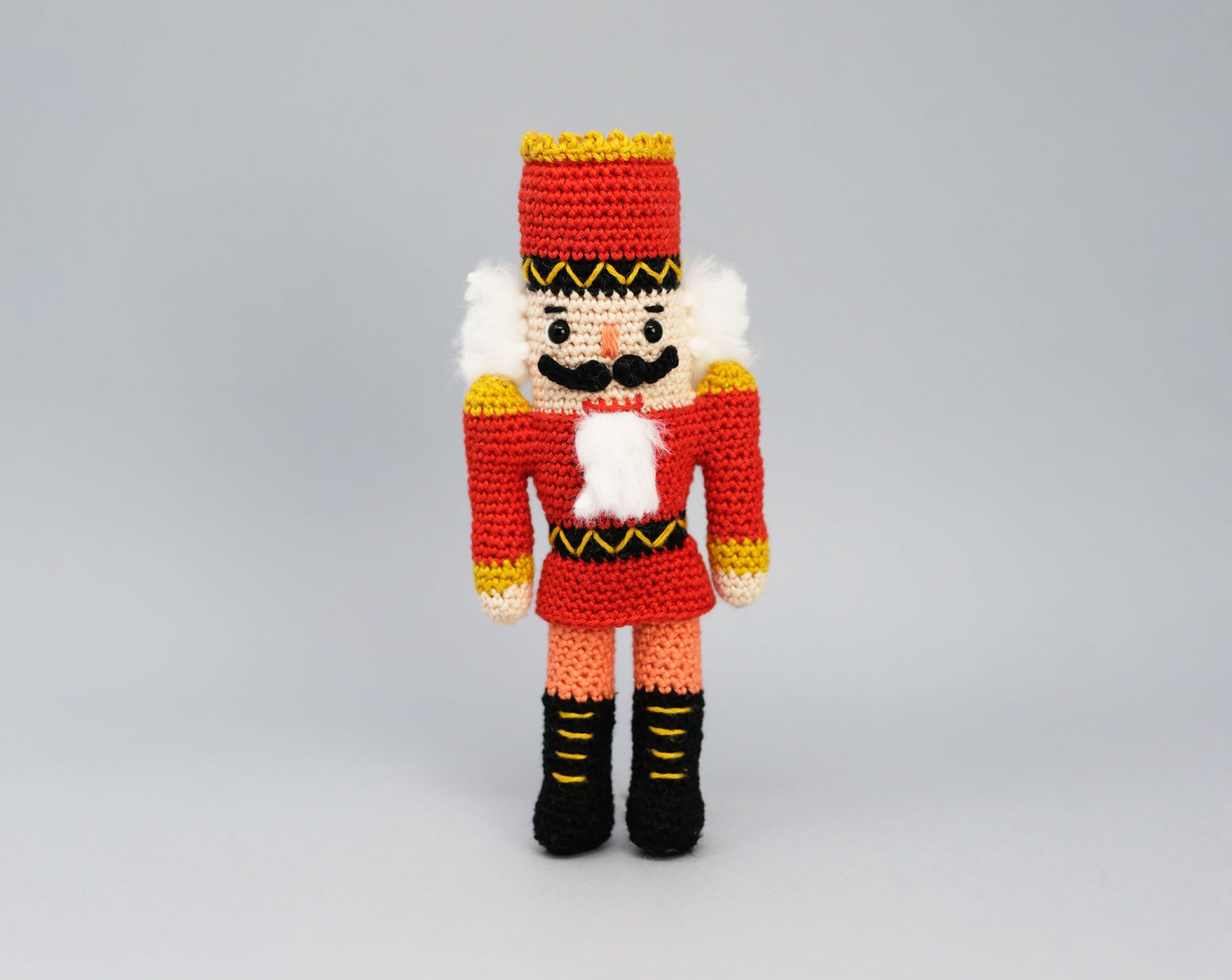 Scheepjes Nutcracker Crochet Kit designed by Kate McCully at Maker Studio Eastbourne.  Limited edition set with yarn and materials to make four 20 cm handmade nutcracker figures, two in red uniforms and two in green.
