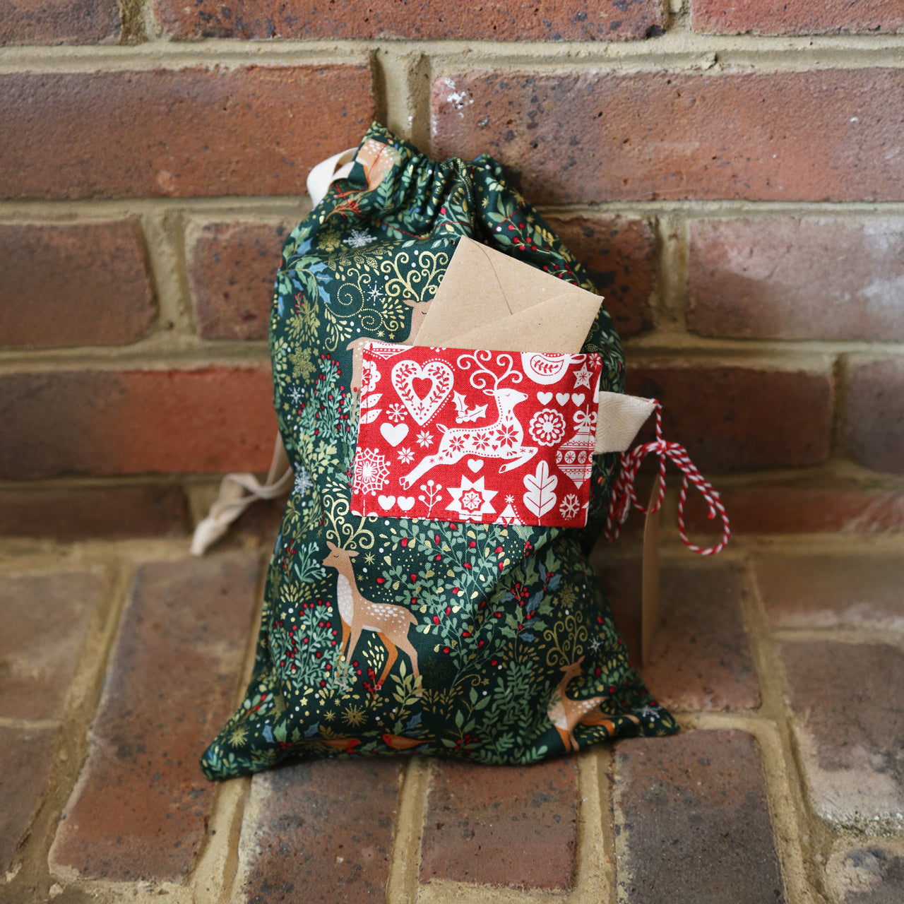 Beginners Christmas themed gift bag  using a sewing machine workshop at Maker Studio Eastbourne